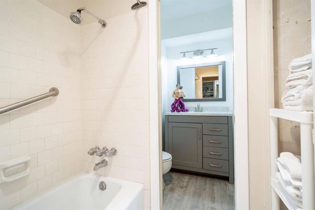shower/tub view of primary bath