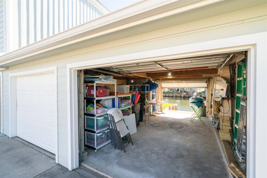 view through garage of personal boat launch