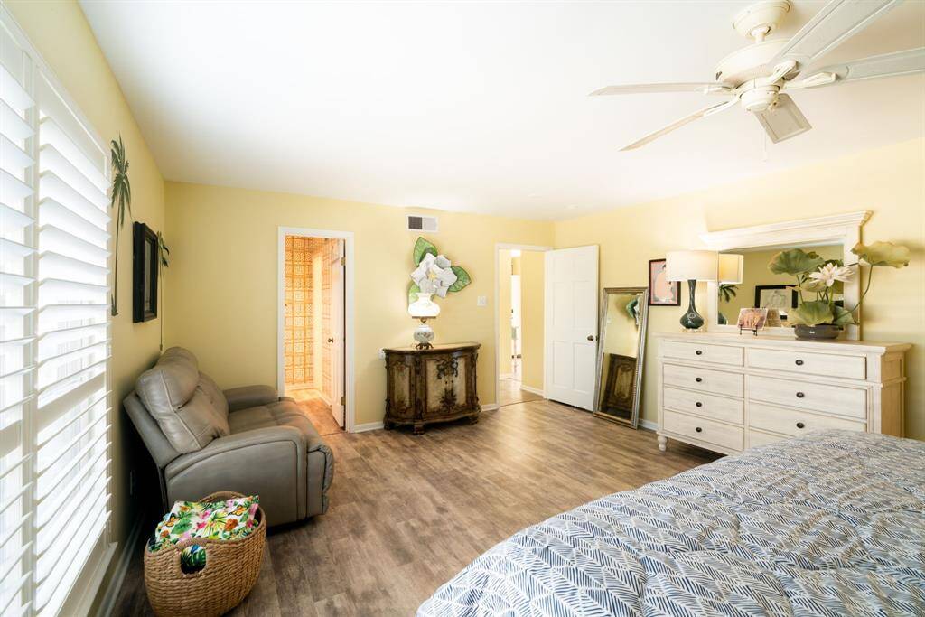 Another view of primary bedroom