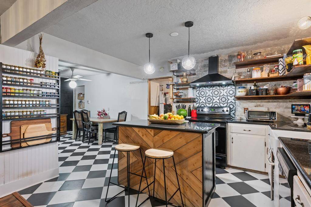 Modern kitchen with stylish finishes and ample space for entertaining.