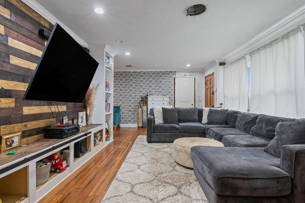 Custom built-in shelving offers stylish and efficient storage solutions.