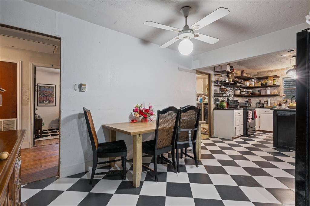 Enjoy the modern updates in this kitchen, featuring stylish tile floors.