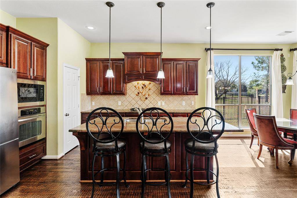This home is bathed in natural light, with large windows throughout that invite sunshine to fill every room, creating a bright and welcoming ambiance.