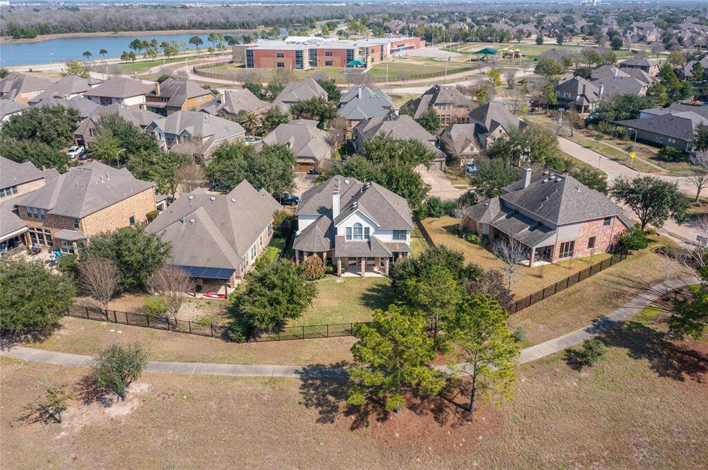 The aerial view highlights the home's prime location, just a stone's throw away from Pope Elementary School, offering convenience and easy access for families.