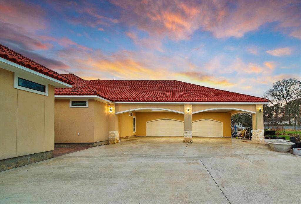 4 Car Wide Garage door with 4 car covered