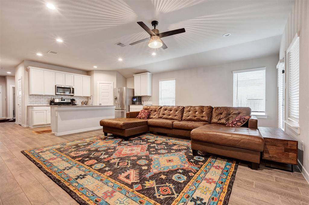 Spacious living room with endless potential—design and customize this space to match your personal style.