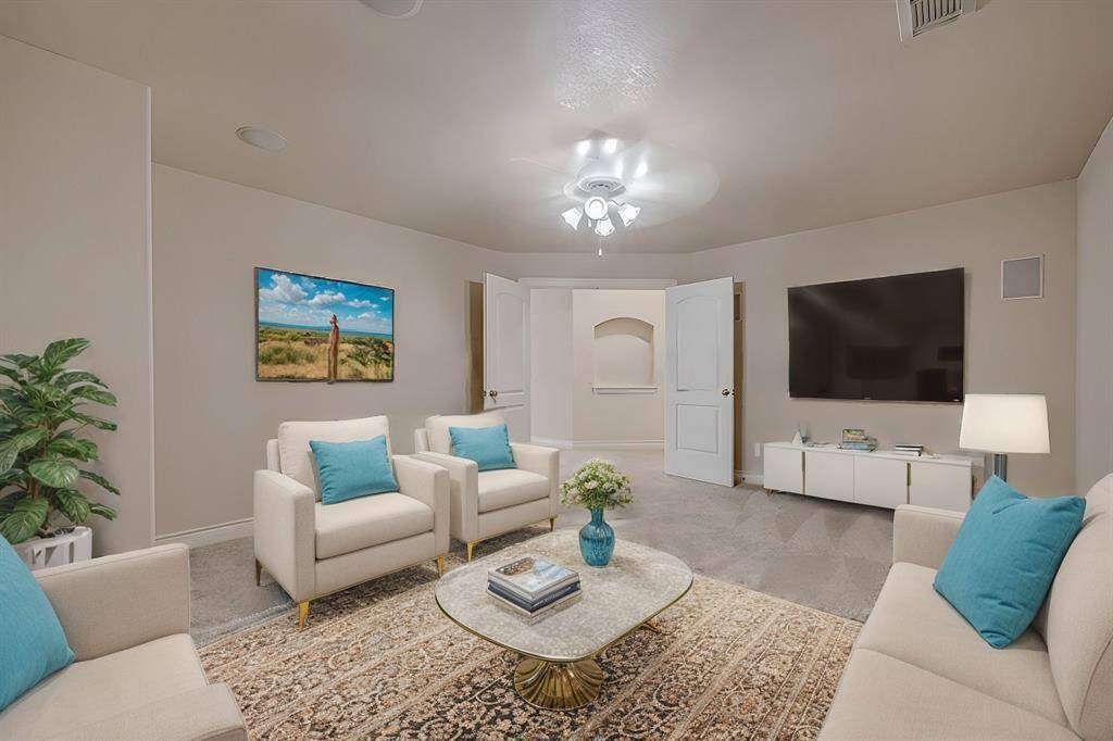The media room includes ample shelving storage or display space for all your media room, movie time accessories or even snacks.  Double door entry, overhead LED lighting, built-in surround sound wiring, custom shelving and neutral colors create a relaxing space for all to enjoy.(Vitrual Stage)