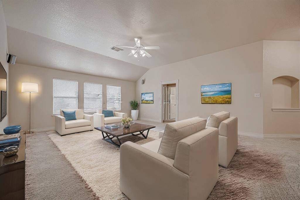 A quiet expansive game room centrally located on the second floor flanked with two bedrooms and one bathroom on either side make this area an easy area to be enjoyed be all residing on this floor.(Virtual Stage)
