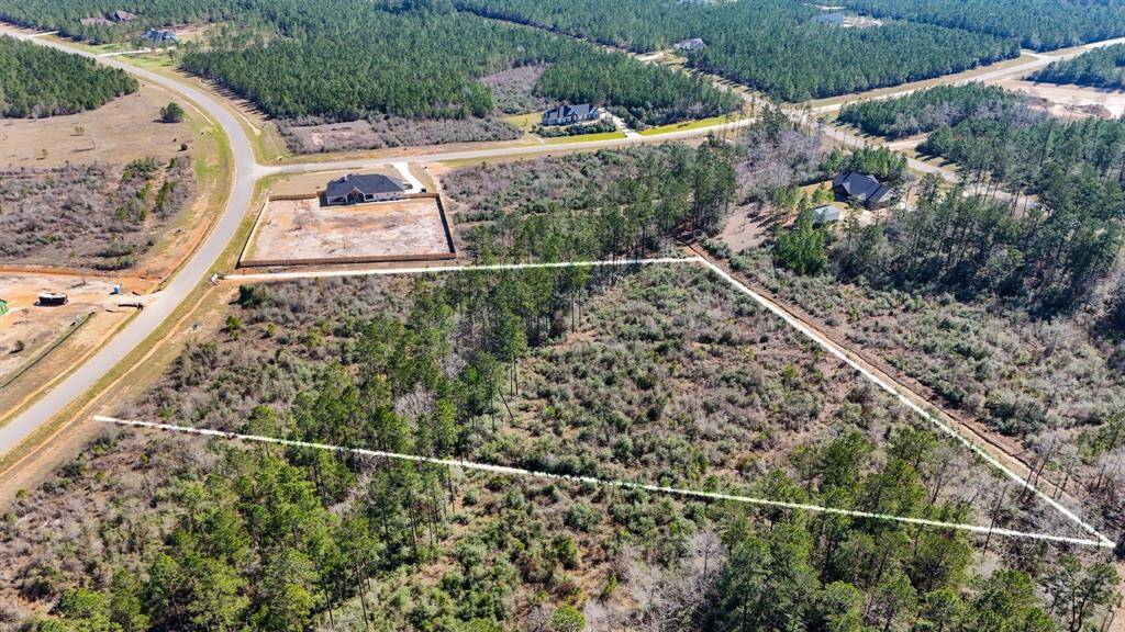 A fantastic view of the property outlining the 5.14 acres. Close proximity to the park!