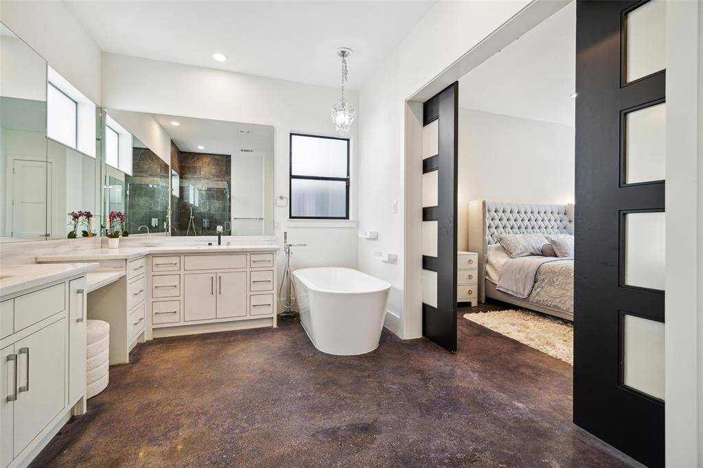 BEAUTIFUL SOAKING TUB AND VANITY