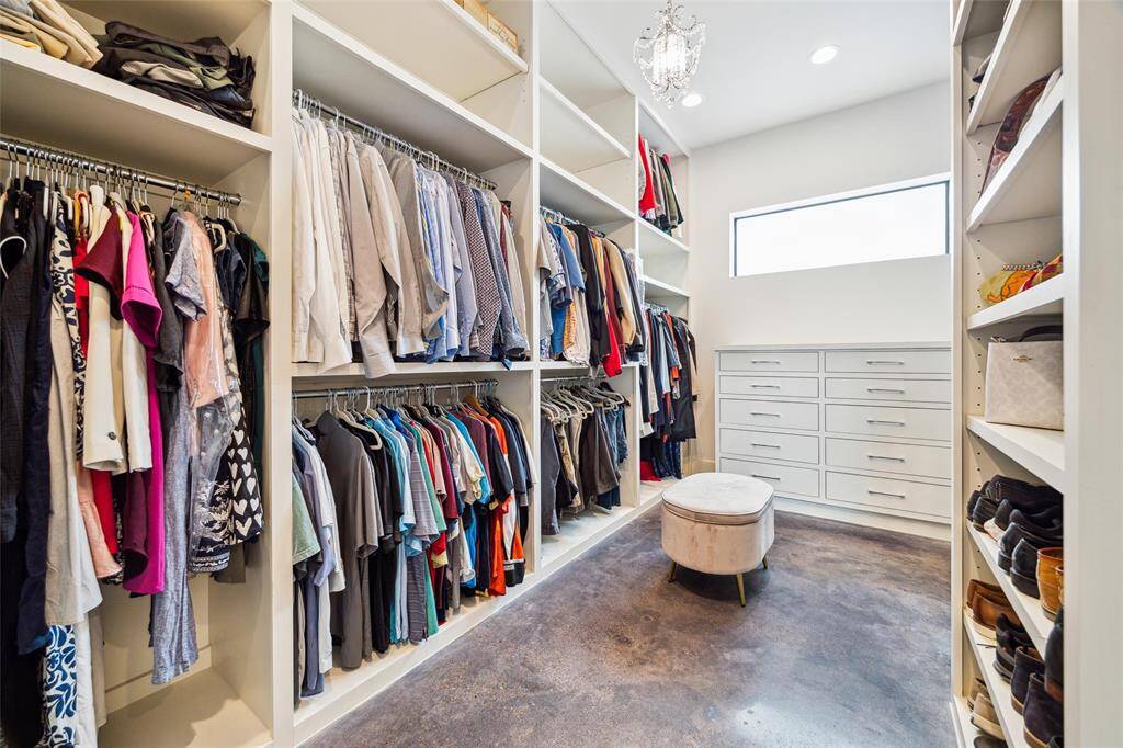 CUSTOM CLOSET WITH PLENTY OF STORAGE