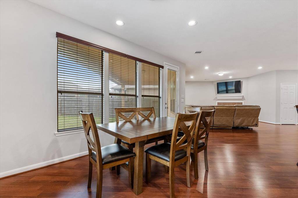 The open floor plan living, breakfast and kitchen make entraining a breeze