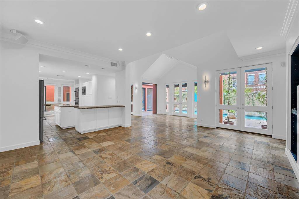 A view from the family room to the kitchen and dining room.