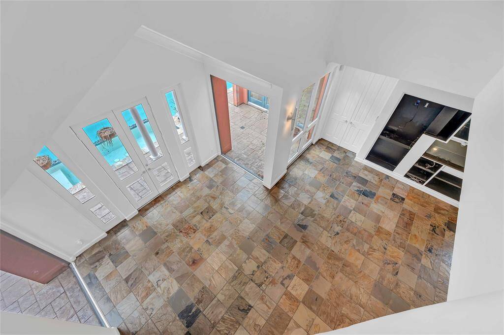 View down from the open landing upstairs.