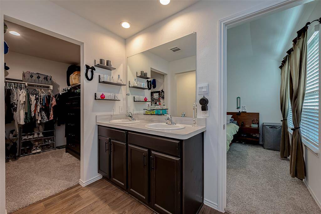 A spacious ensuite complements the master bedroom.