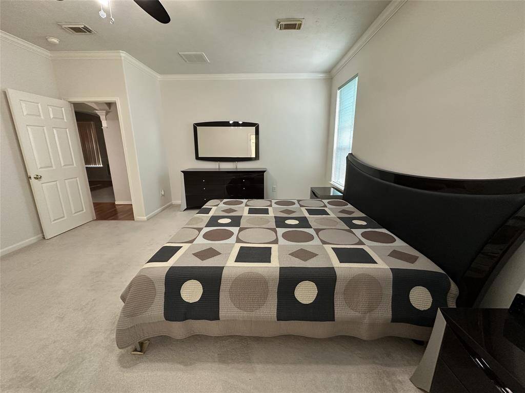 Your primary bedroom retreat. Located downstairs.