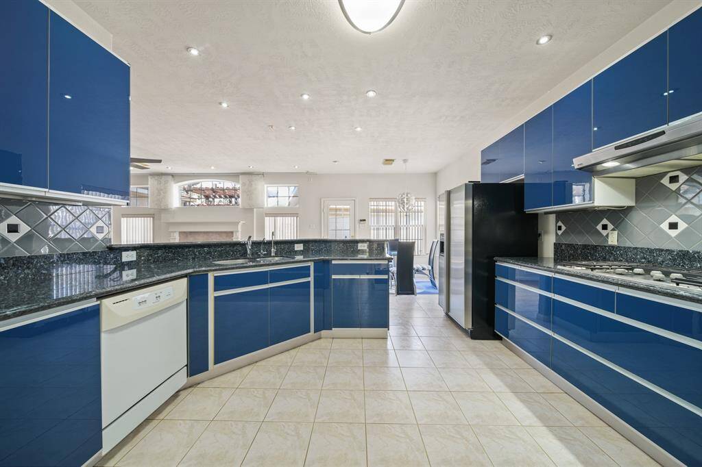 Tons of cabinet storage options in this kitchen.