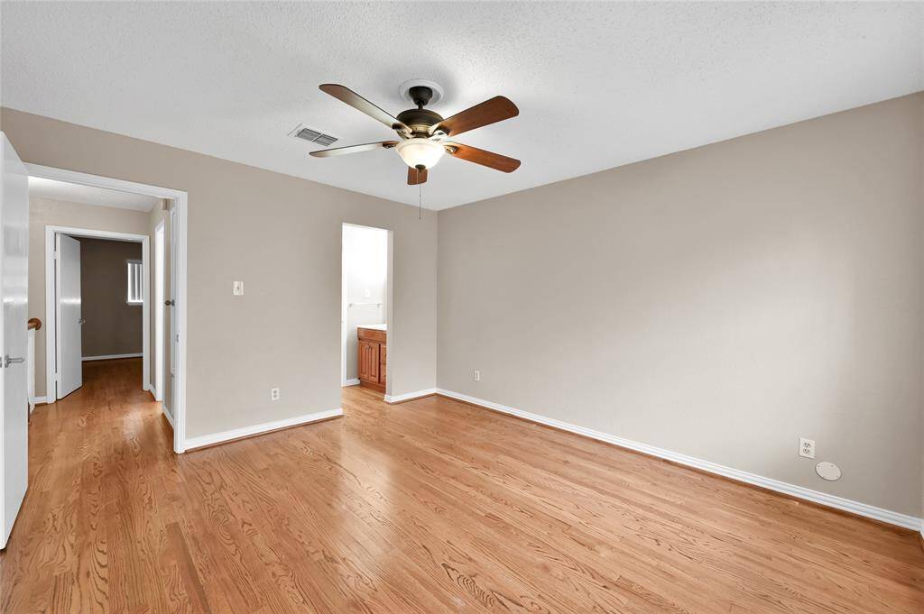 General view of the two bedrooms which share a full bathroom with separate sinks for everyones comfort and privacy!