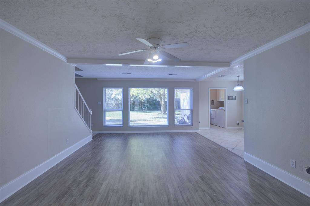 Look at this huge family room! So much room and open to the kitchen/breakfast room! The views from the large picture window are gorgeous!