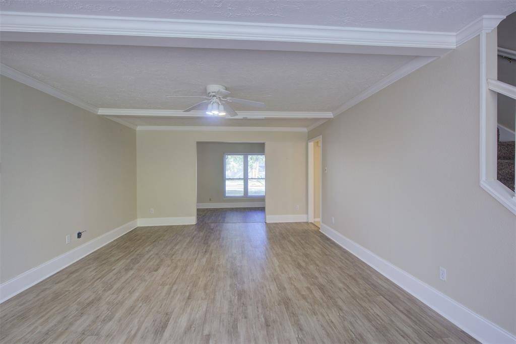 View of the family room looking back toward the formal living and entry way.
