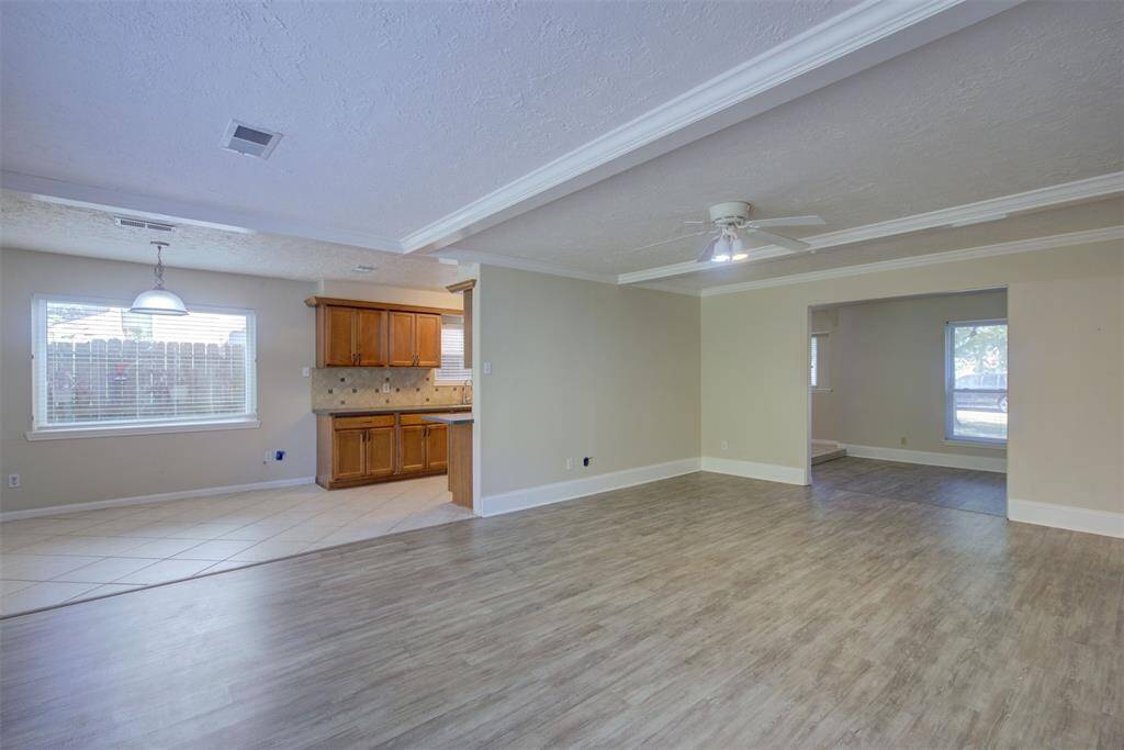 Look how open the family room is to the breakfast room and kitchen! Entertaining will be so fun here!