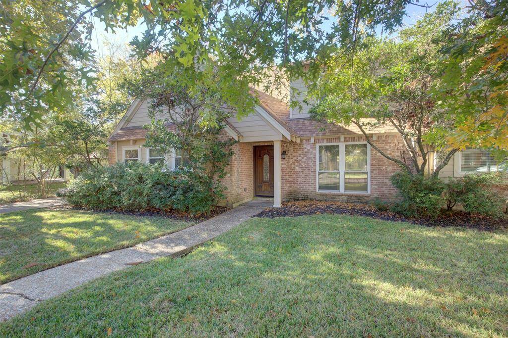 Mature trees and replaced windows give this home great curb appeal!