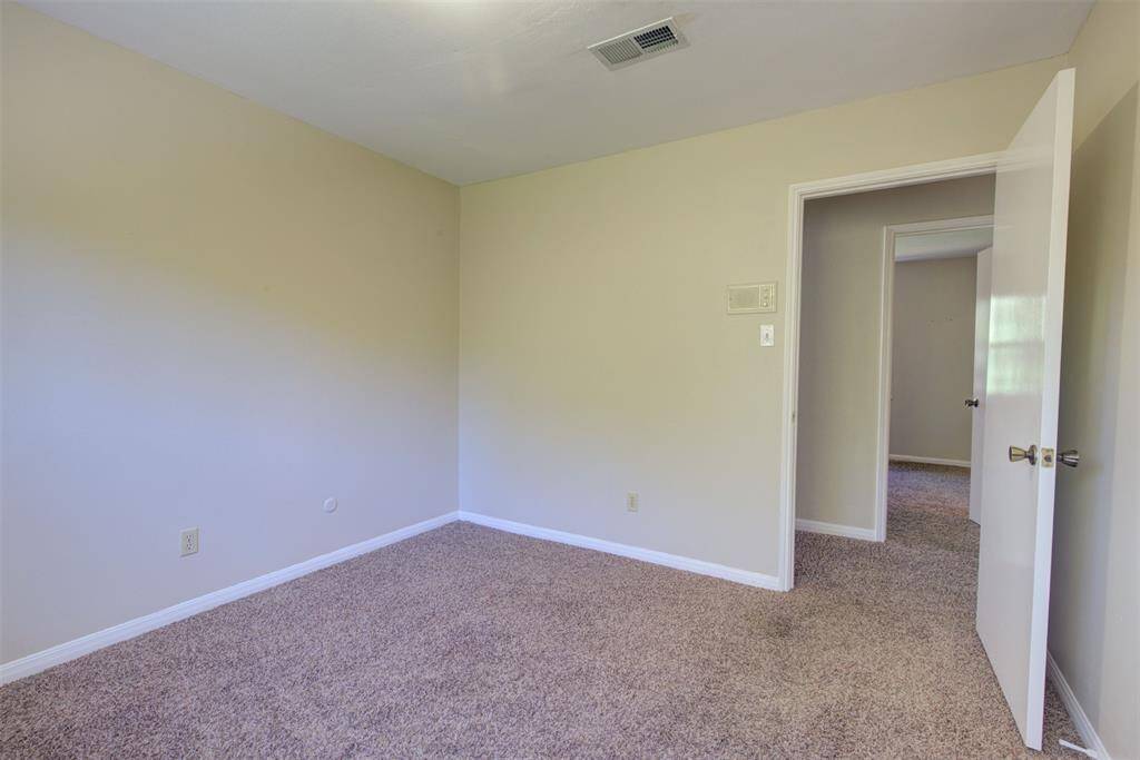 Bedroom number three is upstairs. Recently replaced carpet, neutral paint.