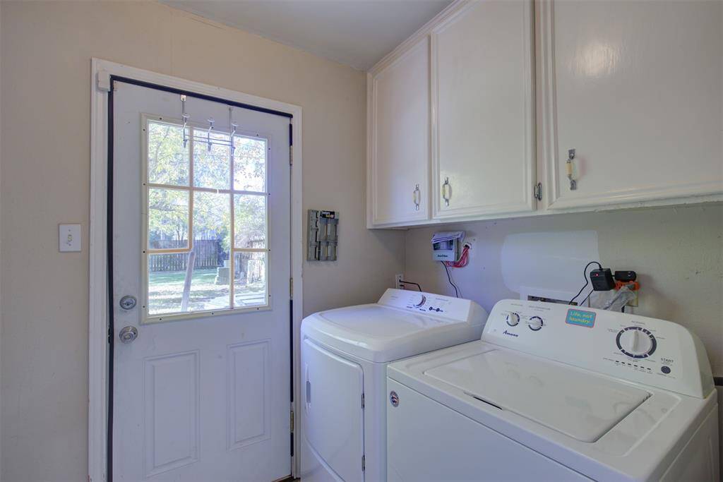 Laundry room off of kitchen.