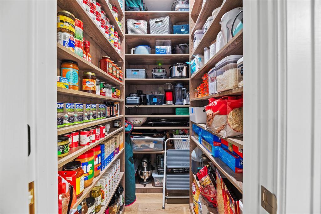 This is one of two massive walk-in pantries. Stock up! You've got plenty of storage space for food, small appliances and more.
