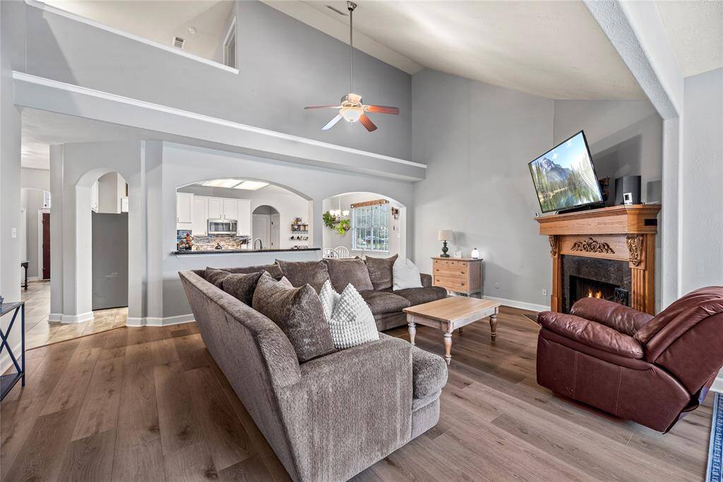 This lovely family room is a great space to gather and visit with your friends and family or enjoy a quiet, peaceful evening at home with your favorite person.