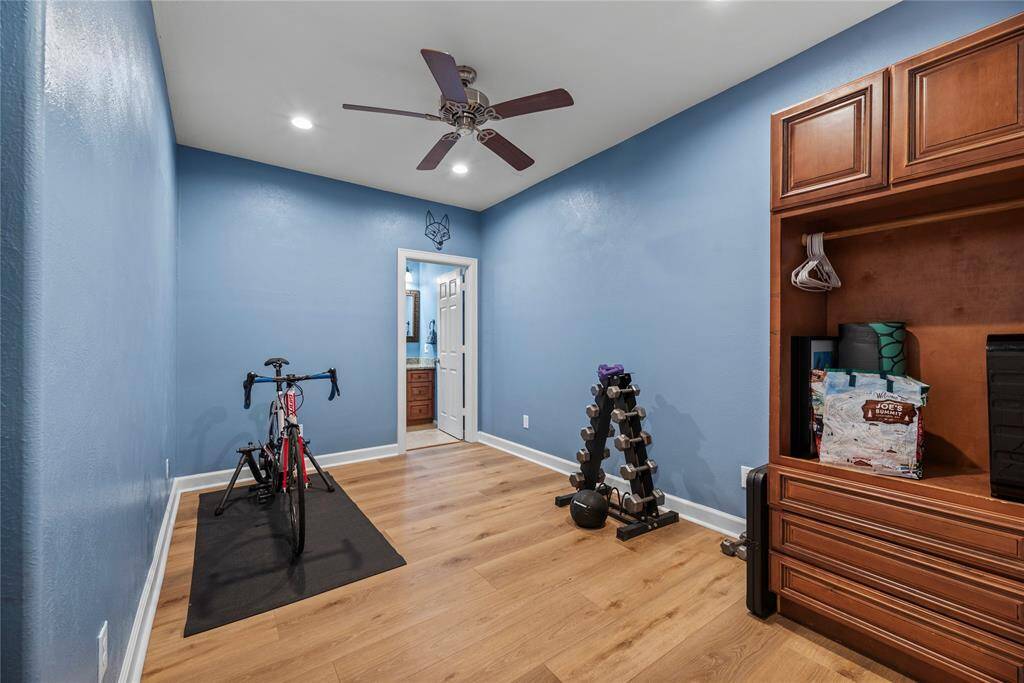 Yet another first-floor bonus room! This incredible room is ready for your personal touches. With a full ensuite bathroom, vinyl plank flooring, designer paint, recessed lights and a cooling fan, we're sure you'll find the perfect use for this space.