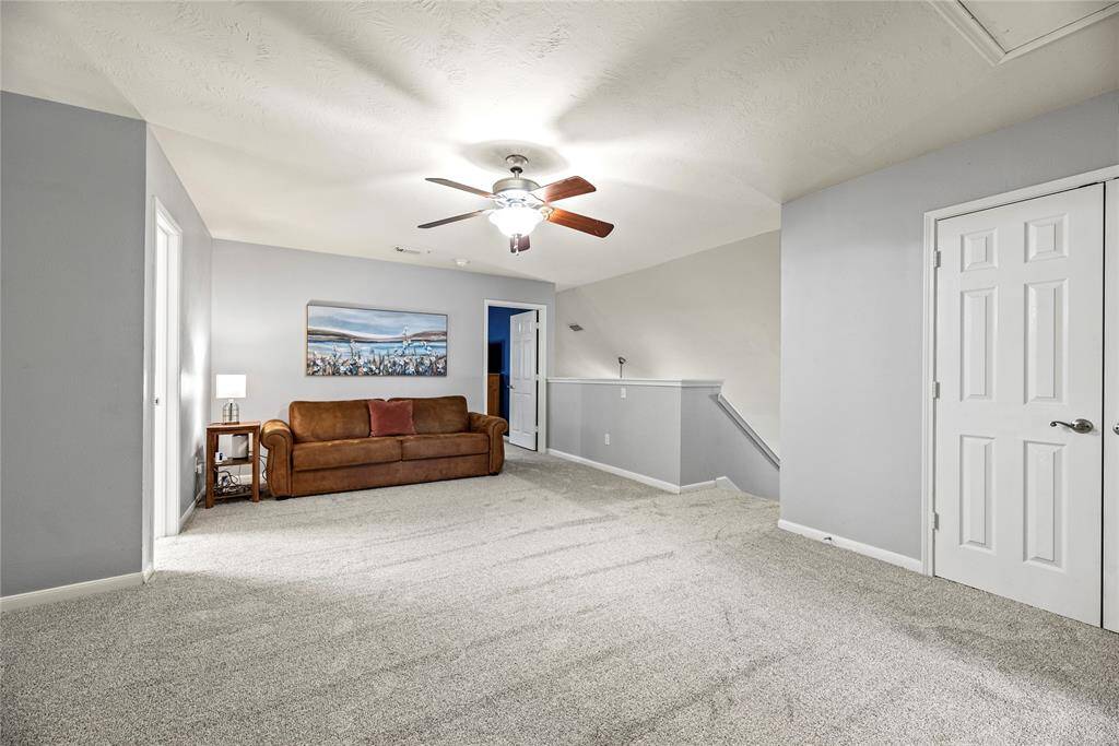 This game room provides the ideal space for rowdy summer slumber parties or competitive game nights with friends.