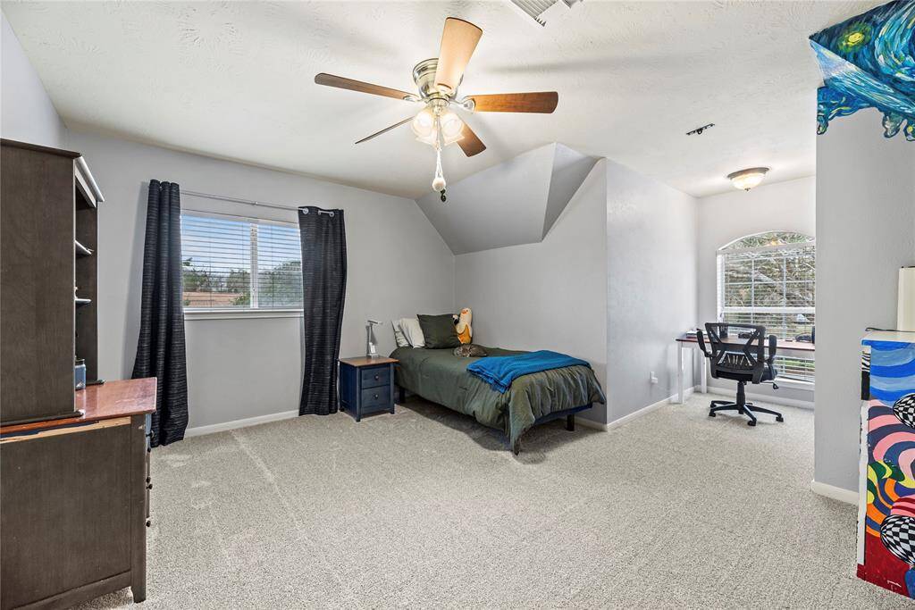 With four designated bedrooms, you will always have room for company. This spacious guest room features neutral carpet and paint, a lit fan, charming dormer, large walk-in closet and easy access to a full bathroom.
