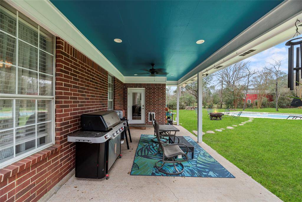 Whether you're hosting lively gatherings or seeking tranquility after a long day, this expansive back yard paradise with a covered patio and a heated pool & spa promises to provide the perfect space where memories are made and stress melts away.