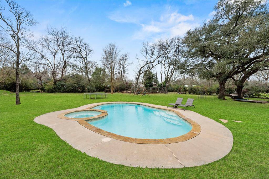 Texas summers are even better with your own private back yard escape. This sparkling heated pool and spa offer the perfect place to unwind, entertain, and enjoy resort-style relaxation right at home.