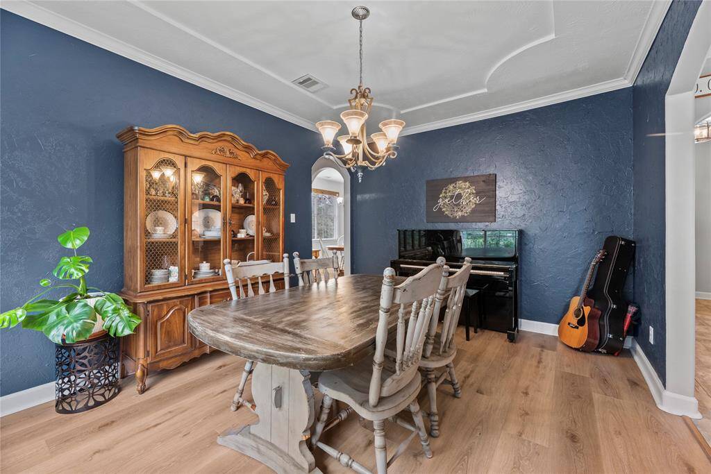 Gather them around your table to honor old traditions and create the new. This elegant formal dining room is the perfect space to host holidays parties and other special occasions.