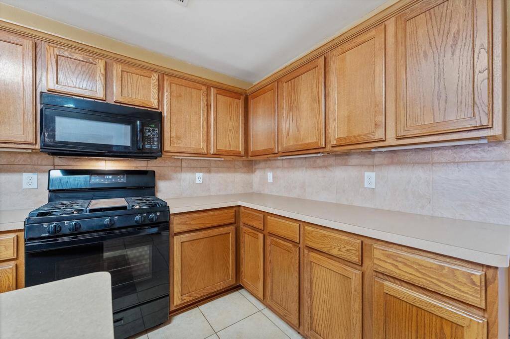 Plenty of cabinet and counter space! And look at all those outlets!