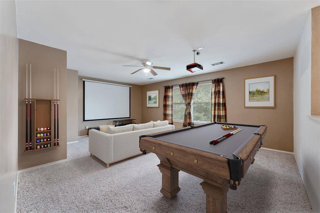 Game room/media room, the perfect place to entertain or let the kids play!! Virtualy staged