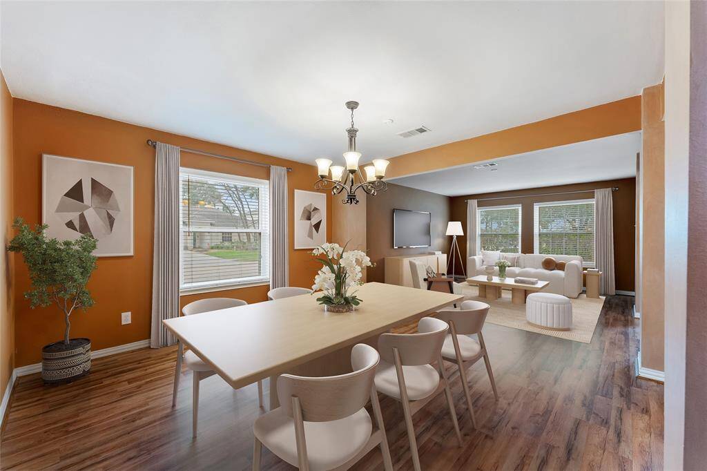 Large and open formal dining are that flows into the second living space or the perfect reading nook! Virtually staged