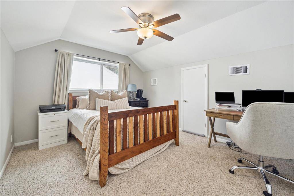 Another spacious guest bedroom with walk-in closet.