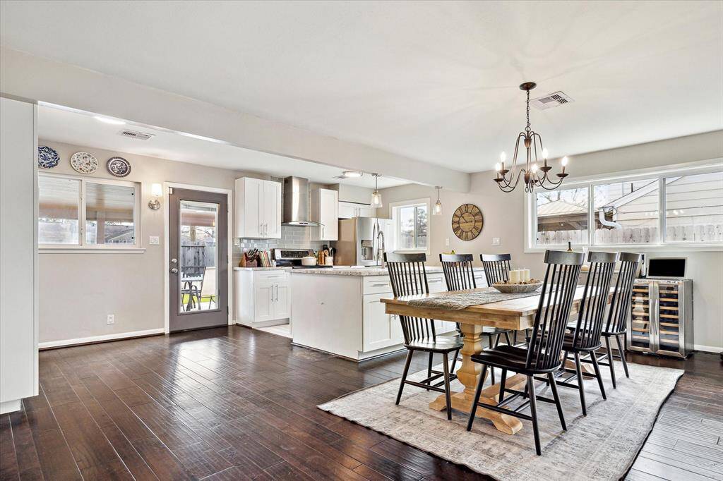 View from the entry toward the dining area showing the easy access to the backyard, perfect for entertaining.