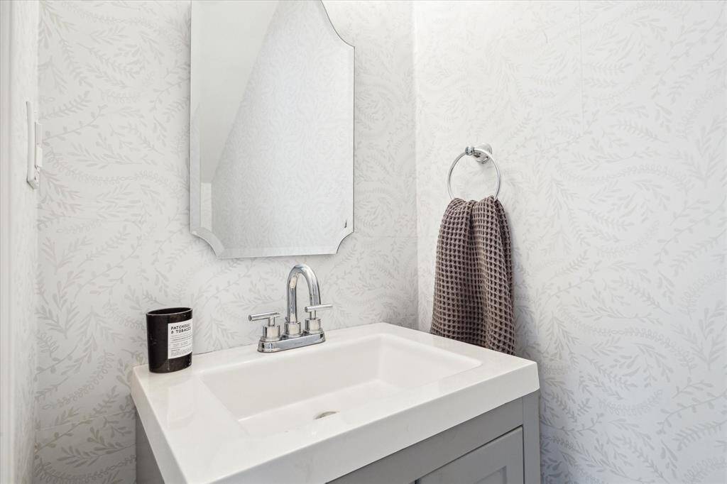 Powder bath conveniently situated off the dining area.