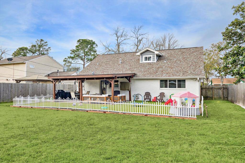 Another perspective of the spacious backyard.