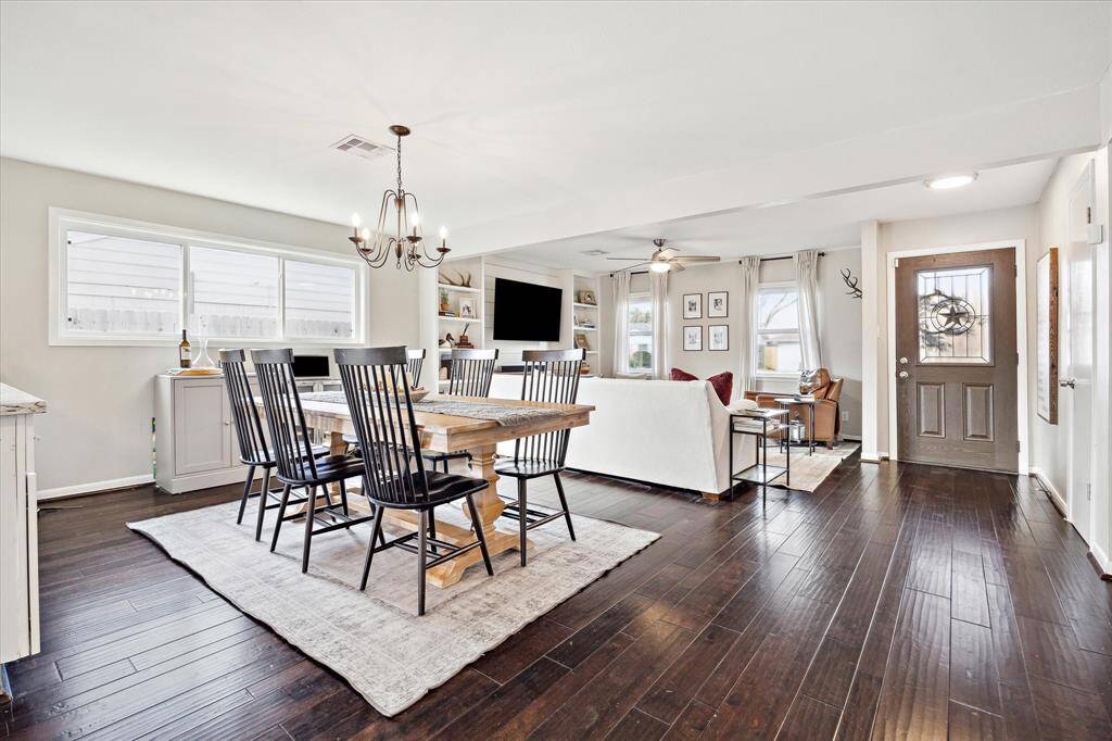 Dining space is conveniently situated between the kitchen and living area.