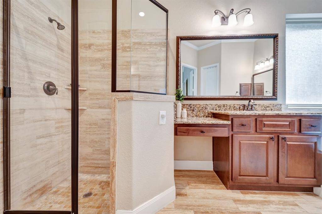 Stand up shower located in the owners retreat.