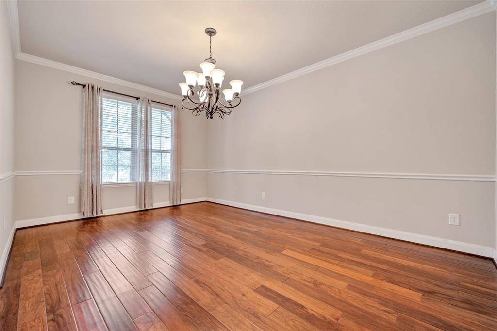 Large dining room located right off the kitchen, at the front of the home.