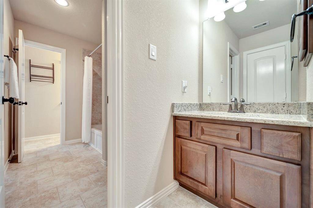Private sink and vanity off the secondary bedrooms on the second floor.
