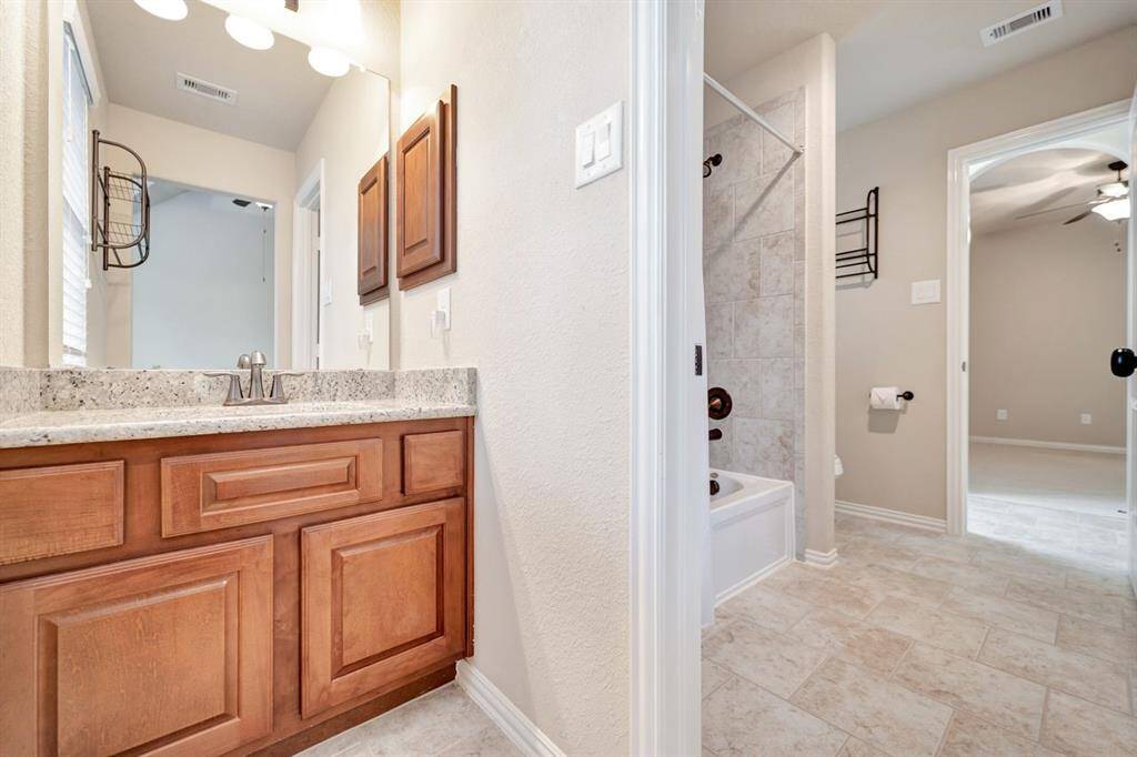 Jack and Jill bathroom off the secondary bedrooms upstairs.