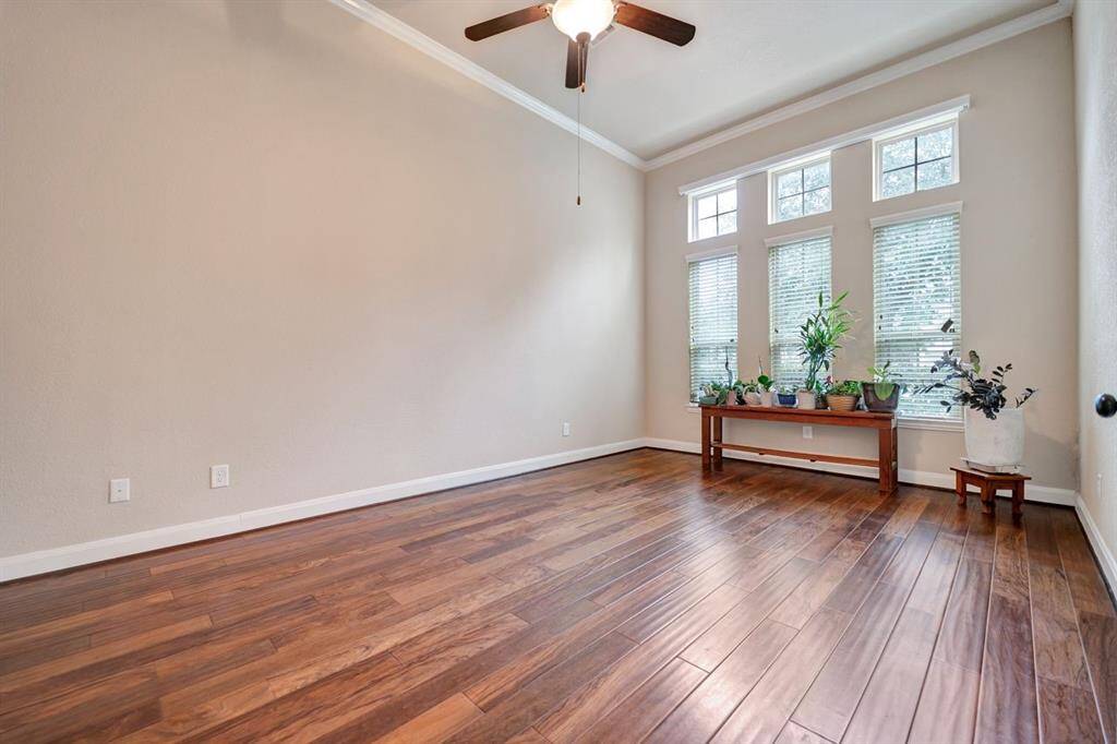 Large over-sized office offers 12 foot soaring ceilings and electric shades for those bright sunny days.