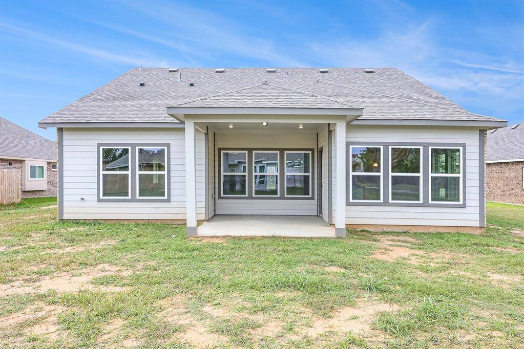 Picture of previously built home-back covered patio